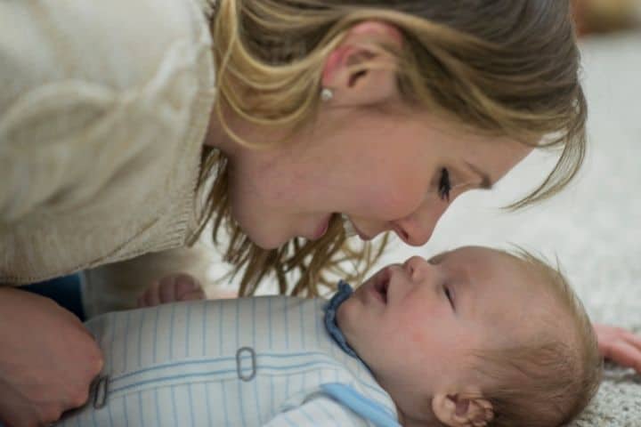 Mother bonding with her young baby