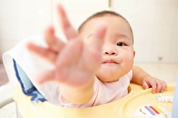 Baby Reaching Out