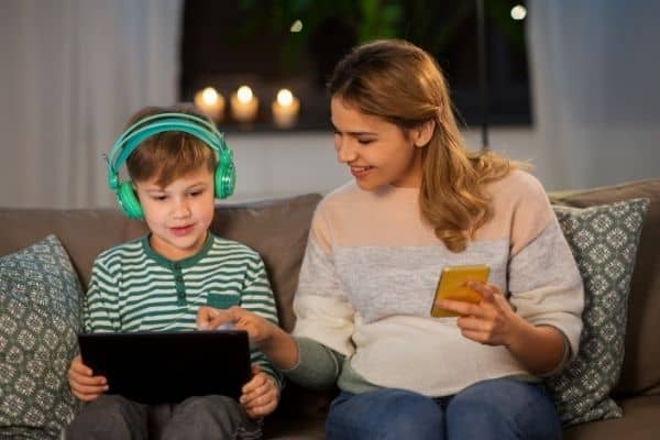 Mother And Son Using Gadgets