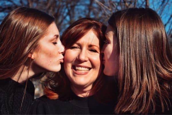 Sweet Children Kissing Mum