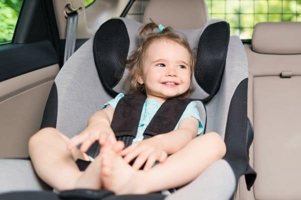 Cute Baby On Car Booster Seat