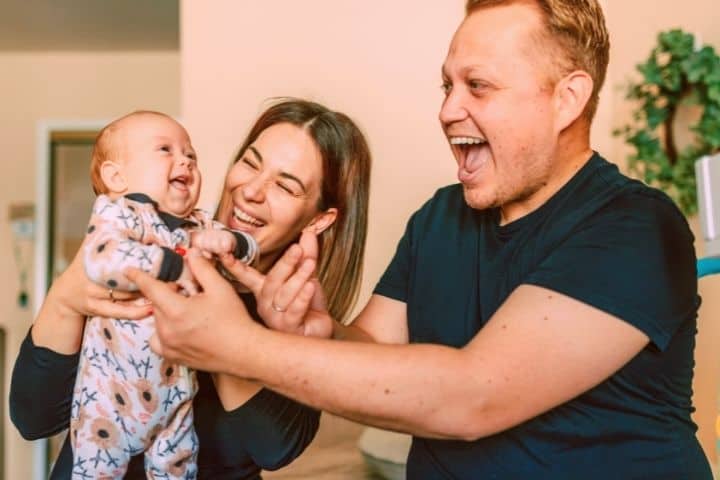 Parents Are Laughing With Their Child