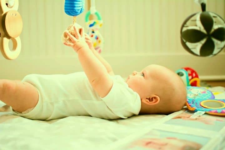 Baby Is Playing With Toys