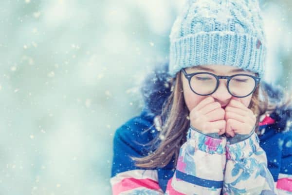 Woman Warming Up Cold Hands