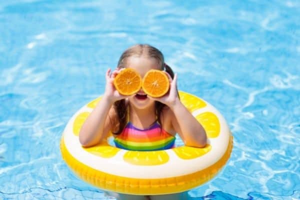 Young Girl In Kiddie Pool