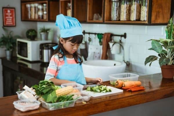 Young Girl In The Kitchen