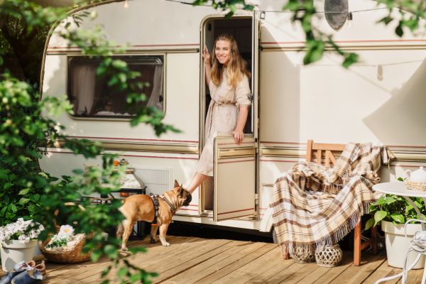 Happy Lady With Dog Staying On Campervan