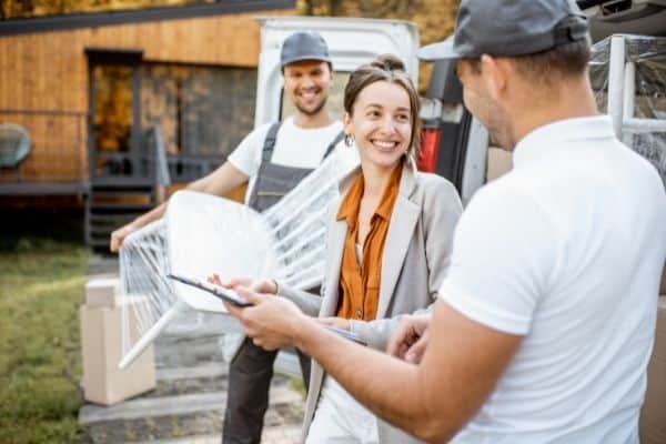 Person Talking To People Moving Furnitures