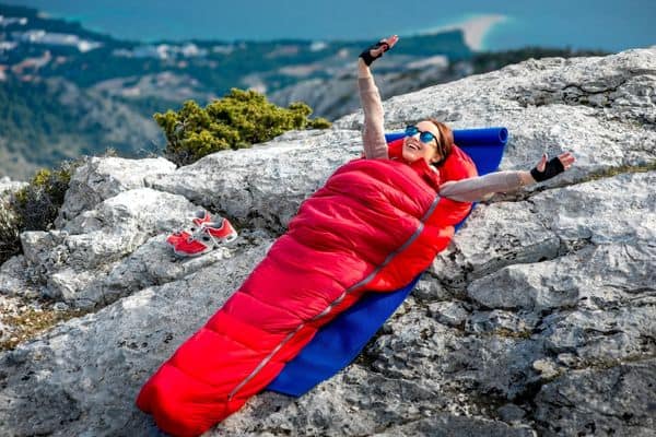 Camping Woman In Sleeping Bag