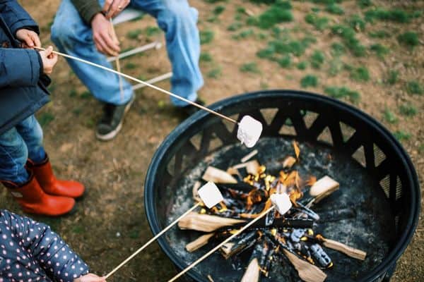 Kids Having Smores In The Backyard