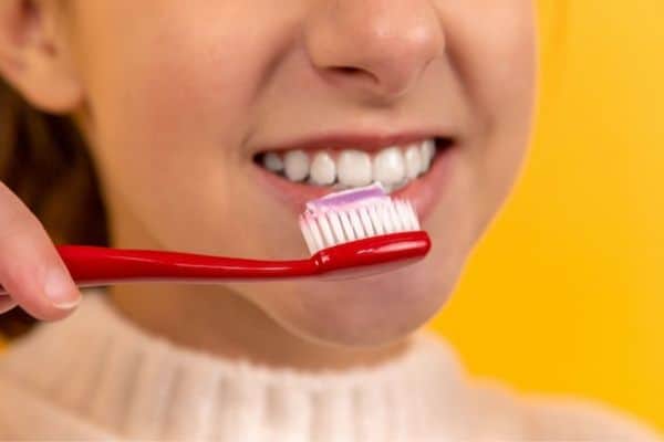 Person Brushing Teeth