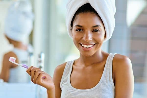 Woman Smiling Brightly Showing White Teeth