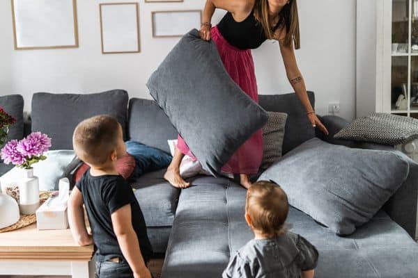 Mum Cleaning While Talking To Kids