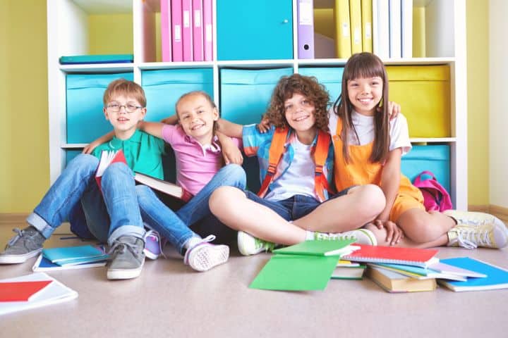 Children Hugging In Library