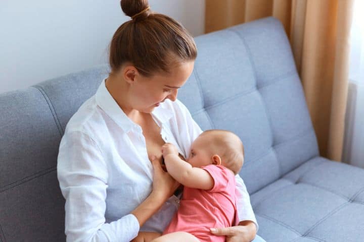 Mom Breast Feeds Her Baby
