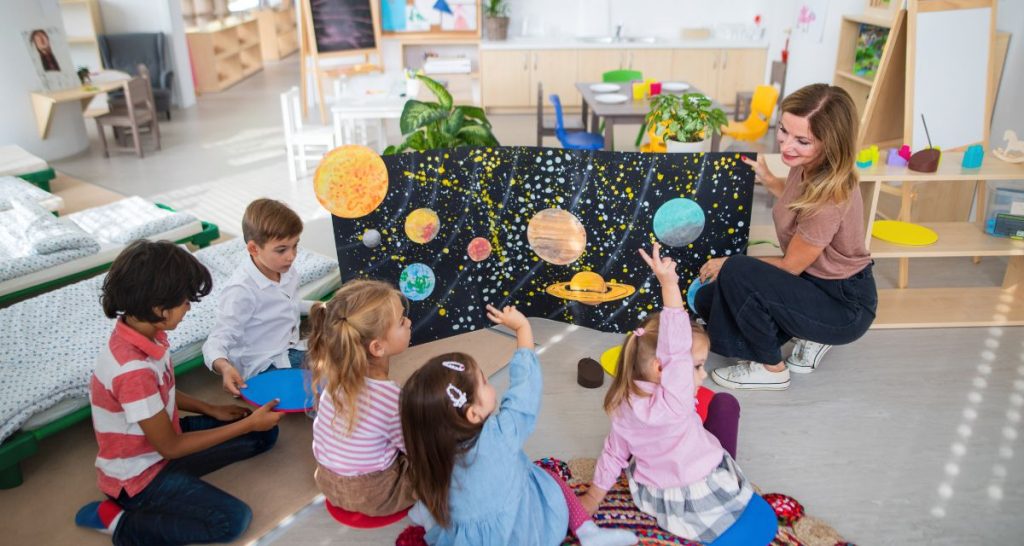 Childcare Center Teacher And Students