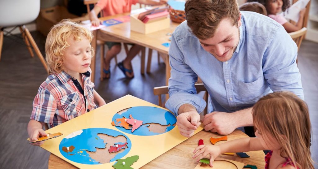 Kids In Childcare Center Learning Shapes And Geography