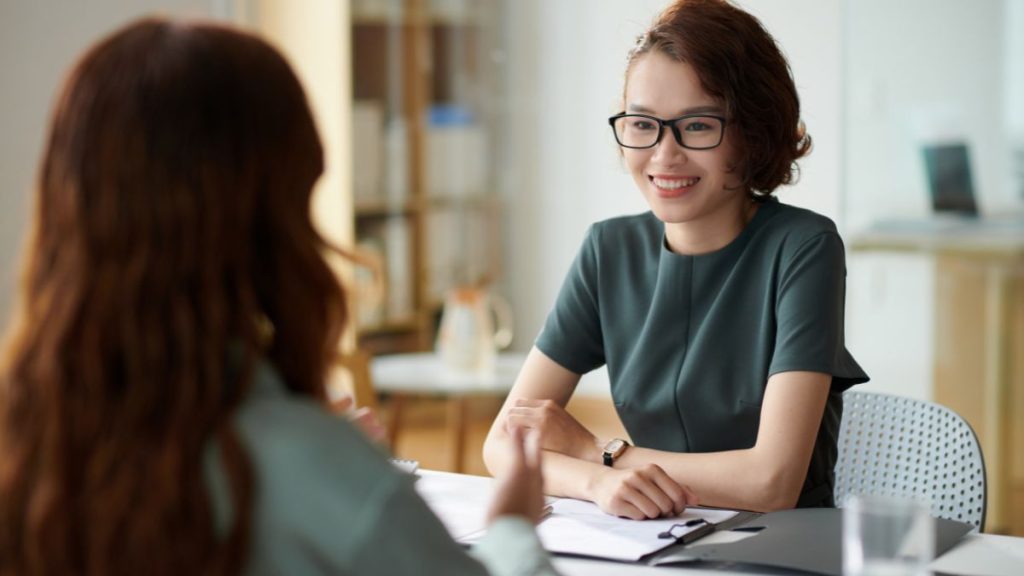 Employer Happily Offering Clear Communication With Employee